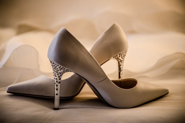 Edmonton wedding photographer - dress and brides shoes detail photograph